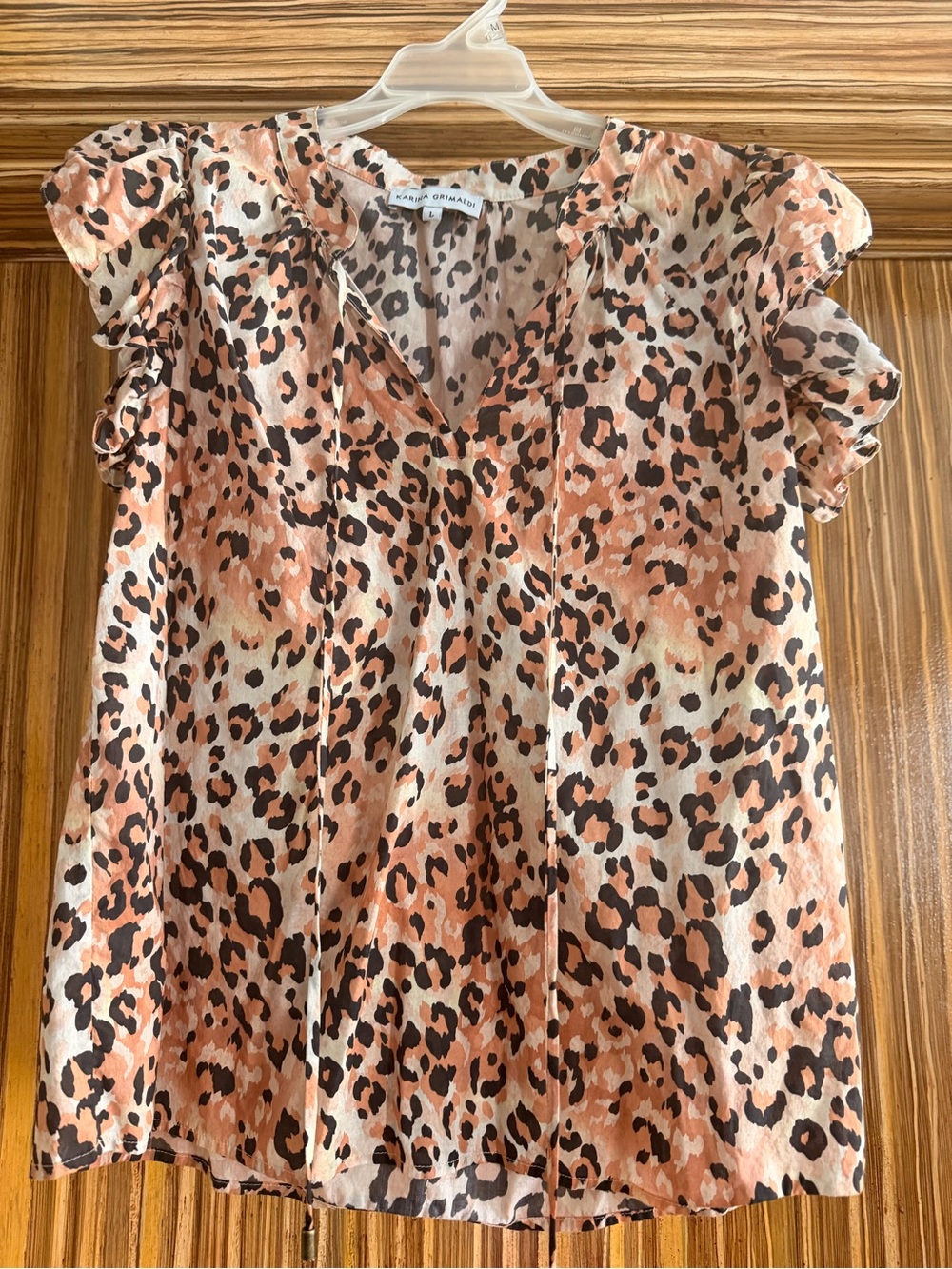 Great fall transitional item! Peach & Black Leopard Ruffle Sleeve Cotton Blouse